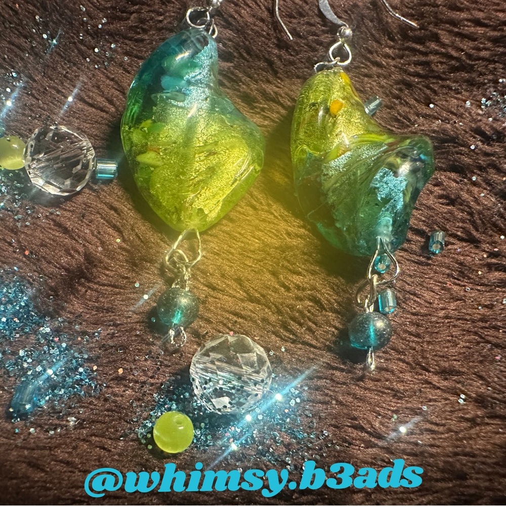 Green and blue statement earrings